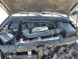 2005 Nissan Frontier LE z VIN 1N6AD07W95C417736, wystawiony jako Copart lot #55112835 z przebiegiem 217 251 mil mil oraz Szkoda całkowita • Salvage title. Historia ofert i sprzedaży dostępna na DreamBid. Obrazek 11.