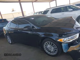 2020 Ford Fusion Titanium with VIN 3FA6P0RU8LR141324, listed as a IAAI auction lot 42004026 with 107,136 mi miles and . Bid and sale history available at DreamBid. Image 13.