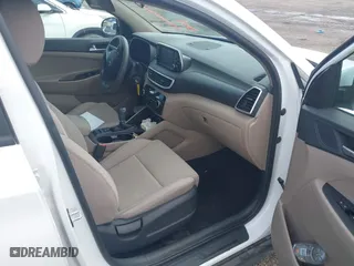 2019 Hyundai Tucson SE with VIN KM8J23A46KU048921, listed as a IAAI auction lot 40781586 with 57,186 mi miles. Bid and sale history available at carsss.com. Image 5.