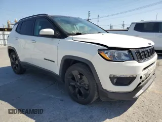 2019 Jeep Compass Altitude with VIN 3C4NJCBB4KT833213, listed as a Copart auction lot 57519955 with 82,738 mi miles and Salvage title. Bid and sale history available at DreamBid. Image 4.