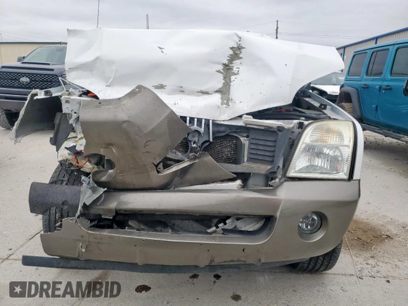 2004 Mercury Mountaineer Convenience z VIN 4M2ZU86K14ZJ30867, wystawiony jako Copart lot #51839405 z przebiegiem 184 668 mil mil oraz Szkoda całkowita • Salvage title. Historia ofert i sprzedaży dostępna na DreamBid. Obrazek 5.