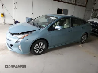 2018 Toyota Prius Two z VIN JTDKARFU9J3065157, wystawiony jako Copart lot #51576655 z przebiegiem 86 233 mil mil oraz Szkoda całkowita • Salvage title. Historia ofert i sprzedaży dostępna na DreamBid. Obrazek 1.