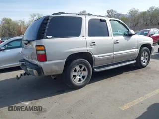 2005 GMC Yukon SLT with VIN 1GKEK13T15J118270, listed as a IAAI auction lot 41937413 with 218,057 mi miles. Bid and sale history available at carsss.com. Image 4.