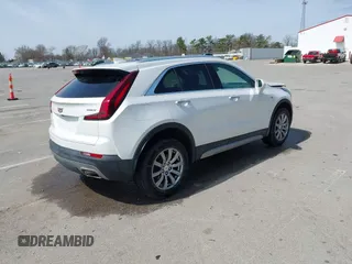 2020 Cadillac XT4 AWD Premium Luxury z VIN 1GYFZDR44LF036461, wystawiony jako IAAI lot #41934371 z przebiegiem 90 545 mil mil oraz . Historia ofert i sprzedaży dostępna na DreamBid. Obrazek 4.