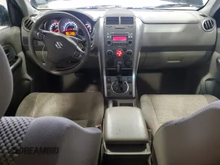2009 Suzuki Grand Vitara with VIN JS3TE042694100010, listed as a Copart auction lot 56716225 with 148,495 mi miles and Salvage title. Bid and sale history available at DreamBid. Image 8.