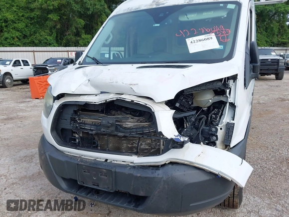 2015 Ford Transit Cargo with VIN 1FTNR1CM2FKB29029, listed as a IAAI auction lot 42286089 with 130,845 mi miles and . Bid and sale history available at DreamBid. Image 6.