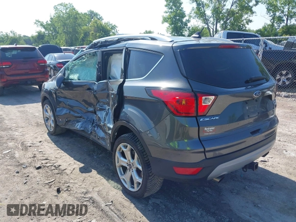 2019 Ford Escape Titanium с VIN 1FMCU9J94KUC24611, выставлен на аукционе IAAI как лот 42595286 с пробегом 77 280 миль миль и . История ставок и продаж доступна на DreamBid. Изображение 3.
