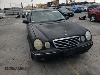 2002 Mercedes-Benz E-Class with VIN WDBJF65J42B486633, listed as a Copart auction lot 76979054 with 151,429 mi miles and Salvage Title. Bid and sale history available at carsss.com. Image 11.
