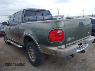 2003 Ford F-150 XLT with VIN 1FTRW08L43KC83824, listed as a IAAI auction lot 41885702 with 242,195 mi miles. Bid and sale history available at carsss.com. Image 3.