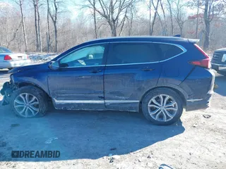 2020 Honda CR-V Touring with VIN 2HKRW2H9XLH605106, listed as a IAAI auction lot 41434008 with Not Provided miles and . Bid and sale history available at carsss.com. Image 13.