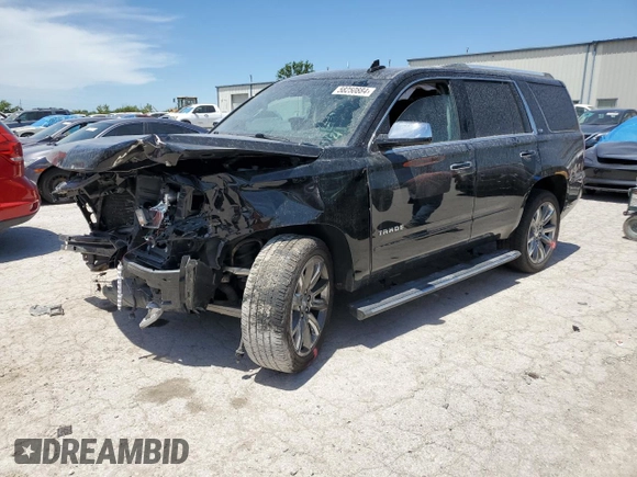2015 Chevrolet Tahoe LTZ z VIN 1GNSKCKC8FR506151, wystawiony jako Copart lot #59948174 z przebiegiem Nie podano mil oraz Szkoda całkowita • Salvage title. Historia ofert i sprzedaży dostępna na DreamBid. Obrazek 1.