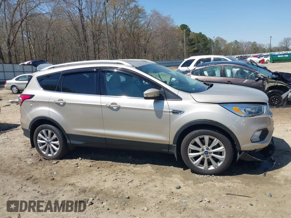 2017 Ford Escape Titanium with VIN 1FMCU9JD3HUC90273, listed as a IAAI auction lot 41828236 with 71,351 mi miles. Bid and sale history available at carsss.com. Image 12.
