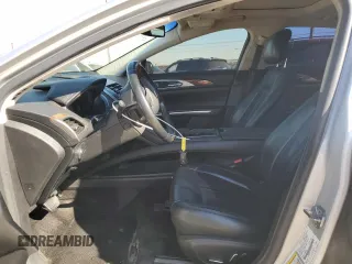 2015 Lincoln MKZ z VIN 3LN6L2G9XFR610736, wystawiony jako Copart lot #80662274 z przebiegiem 101 441 mil mil oraz Szkoda całkowita • Salvage title. Historia ofert i sprzedaży dostępna na DreamBid. Obrazek 7.