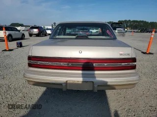 1994 Buick Century Special SJ with VIN 1G4AG55M1R6505334, listed as a Copart auction lot 73691894 with 256,958 mi miles and Salvage Title. Bid and sale history available at carsss.com. Image 6.