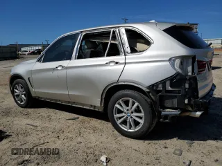 2014 BMW X5 xDrive35i with VIN 5UXKR0C55E0H23681, listed as a Copart auction lot 52183885 with 142,290 mi miles and Salvage Title. Bid and sale history available at carsss.com. Image 2.