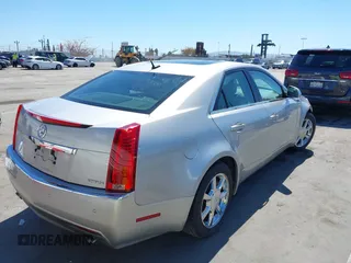 2008 Cadillac CTS RWD with VIN 1G6DM577280111413, listed as a IAAI auction lot 42238643 with 114,706 mi miles and . Bid and sale history available at DreamBid. Image 4.