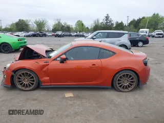 2014 Scion FR-S z VIN JF1ZNAA16E9703911, wystawiony jako IAAI lot #42079578 z przebiegiem 95 754 mil mil oraz . Historia ofert i sprzedaży dostępna na DreamBid. Obrazek 14.