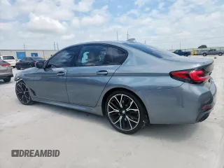 2022 BMW 5 Series 530i with VIN WBA53BH00NWX59634, listed as a Copart auction lot 61598505 with 69,130 mi miles and Salvage title. Bid and sale history available at DreamBid. Image 2.