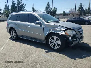 2012 Mercedes-Benz GL 450 z VIN 4JGBF7BE2CA766315, wystawiony jako Copart lot #56687985 z przebiegiem 180 016 mil mil oraz Szkoda całkowita • Salvage title. Historia ofert i sprzedaży dostępna na DreamBid. Obrazek 14.