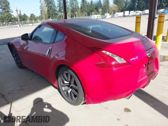 2016 Nissan 370Z with VIN JN1AZ4EH6GM931396, listed as a IAAI auction lot 42034122 with 16,477 mi miles. Bid and sale history available at carsss.com. Image 3.