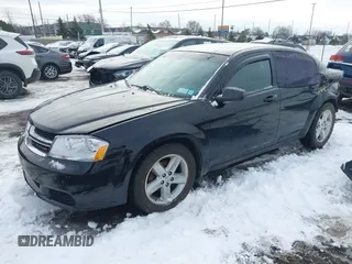 2013 Dodge Avenger SE with VIN 1C3CDZAB3DN564342, listed as a IAAI auction lot 41192817 with 159,216 mi miles and . Bid and sale history available at DreamBid. Image 18.