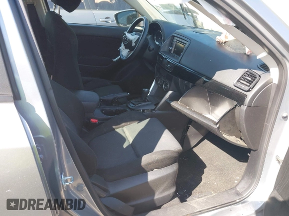 2013 Mazda CX-5 Sport z VIN JM3KE2BE9D0132928, wystawiony jako IAAI lot #41997589 z przebiegiem Nie podano mil oraz . Historia ofert i sprzedaży dostępna na DreamBid. Obrazek 5.
