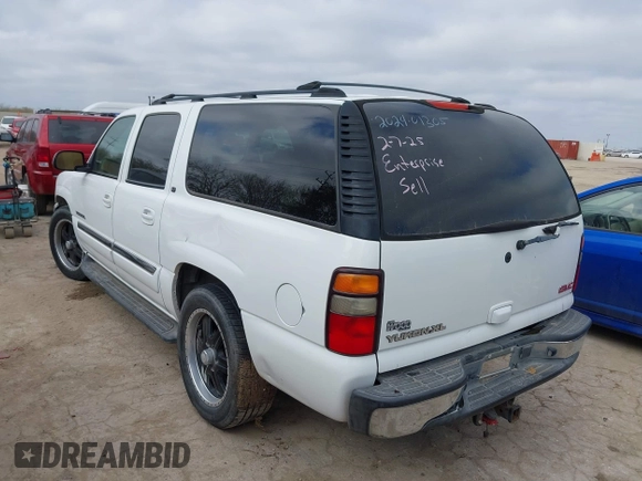2004 GMC Yukon XL SLT with VIN 3GKEC16Z34G162090, listed as a IAAI auction lot 41600676 with 184,765 mi miles. Bid and sale history available at carsss.com. Image 3.
