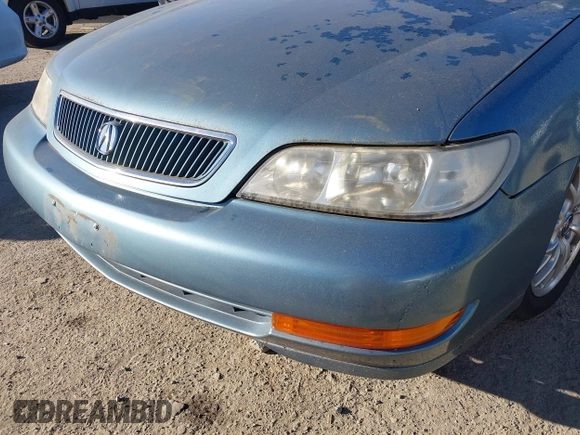 1999 Acura CL Premium z VIN 19UYA2257XL008773, wystawiony jako IAAI lot #41560238 z przebiegiem 179 945 mil mil oraz . Historia ofert i sprzedaży dostępna na DreamBid. Obrazek 6.