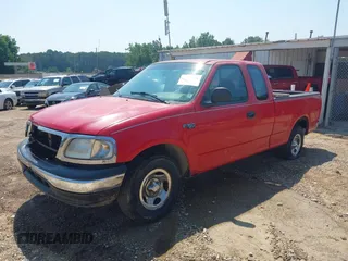 2000 Ford F-150 XL with VIN 1FTZX1724YNA42041, listed as a IAAI auction lot 42577102 with Not provided miles and . Bid and sale history available at DreamBid. Image 2.