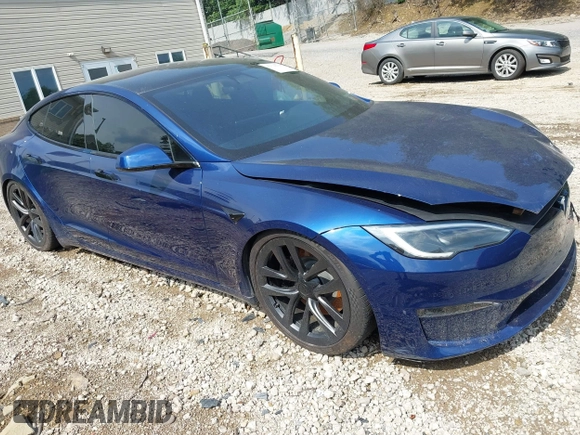 2022 Tesla Model S with VIN 5YJSA1E55NF486443, listed as a IAAI auction lot 42720110 with Not provided miles and . Bid and sale history available at DreamBid. Image 1.