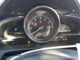 2018 Mazda CX-3 Grand Touring z VIN JM1DKFD75J0319224, wystawiony jako Copart lot #87504495 z przebiegiem 47 466 mil mil oraz Szkody całkowita. Historia ofert i sprzedaży dostępna na DreamBid. Obrazek 9.