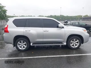 2011 Lexus GX 460 with VIN JTJBM7FX7B5029749, listed as a IAAI auction lot 42266609 with 141,525 mi miles and . Bid and sale history available at DreamBid. Image 13.