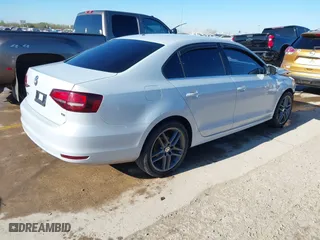 2017 Volkswagen Jetta 1.4T S with VIN 3VW167AJ0HM405252, listed as a IAAI auction lot 41200004 with 82,015 mi miles. Bid and sale history available at carsss.com. Image 4.