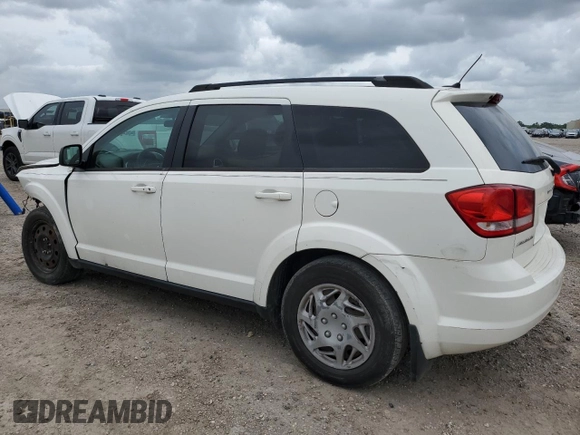 2014 Dodge Journey SE with VIN 3C4PDCAB7ET240936, listed as a Copart auction lot 55115645 with 242,155 mi miles and Salvage title. Bid and sale history available at DreamBid. Image 2.