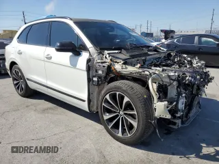 2018 Bentley Bentayga Signature z VIN SJAAC2ZV3JC016779, wystawiony jako Copart lot #54077865 z przebiegiem Nie podano mil oraz Szkoda całkowita • Salvage title. Historia ofert i sprzedaży dostępna na DreamBid. Obrazek 4.