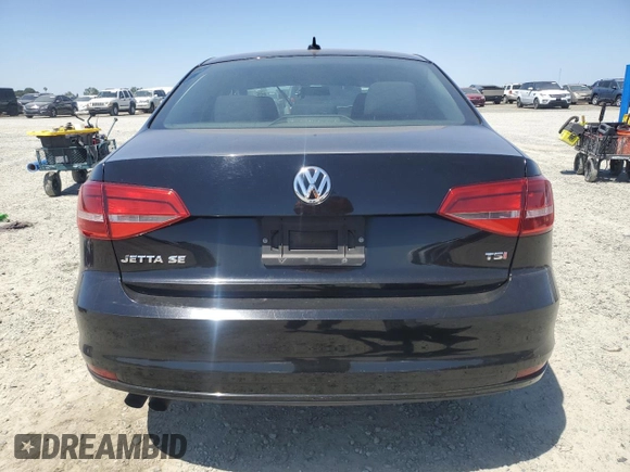 2015 Volkswagen Jetta SE z VIN 3VWD17AJ8FM231567, wystawiony jako Copart lot #55333725 z przebiegiem Nie podano mil oraz Szkoda całkowita • Salvage title. Historia ofert i sprzedaży dostępna na DreamBid. Obrazek 6.