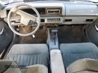 1989 Oldsmobile Cutlass z VIN 1G3WH14W1KD301718, wystawiony jako Copart lot #71632384 z przebiegiem Nie podano mil oraz Szkody całkowita. Historia ofert i sprzedaży dostępna na DreamBid. Obrazek 8.