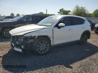 2019 Mazda CX-5 Grand Touring with VIN JM3KFBDM2K1663140, listed as a Copart auction lot 61713755 with 68,101 mi miles and Salvage title. Bid and sale history available at DreamBid. Image 1.