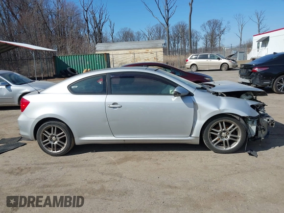 2005 Scion tC with VIN JTKDE177050043393, listed as a IAAI auction lot 41762368 with 170,244 mi miles. Bid and sale history available at carsss.com. Image 13.