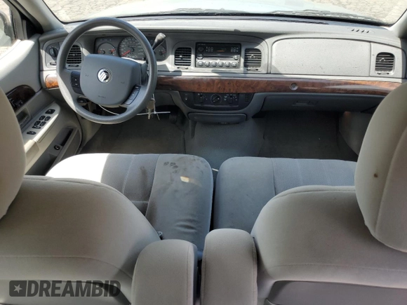 2005 Mercury Grand Marquis GS z VIN 2MEFM74W45X611002, wystawiony jako Copart lot #56645615 z przebiegiem 141 059 mil mil oraz Tytuł czysty. Historia ofert i sprzedaży dostępna na DreamBid. Obrazek 8.