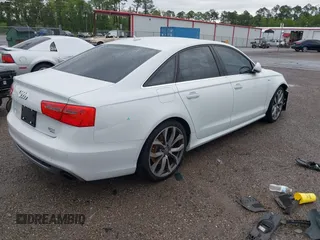 2013 Audi A6 Prestige with VIN WAUHGAFC2DN153202, listed as a IAAI auction lot 42242052 with 163,295 mi miles and . Bid and sale history available at DreamBid. Image 4.