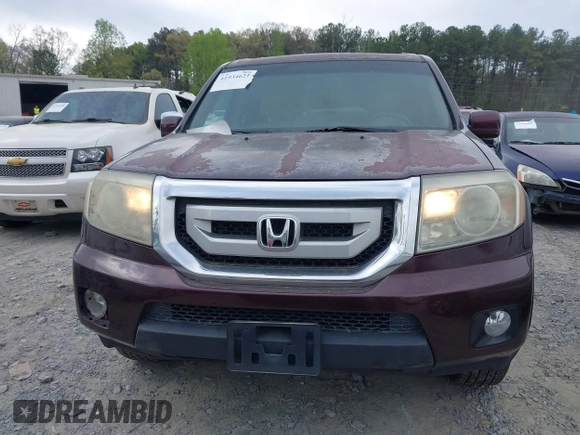 2011 Honda Pilot EX-L with VIN 5FNYF3H61BB050776, listed as a IAAI auction lot 41934621 with 172,424 mi miles and . Bid and sale history available at DreamBid. Image 12.