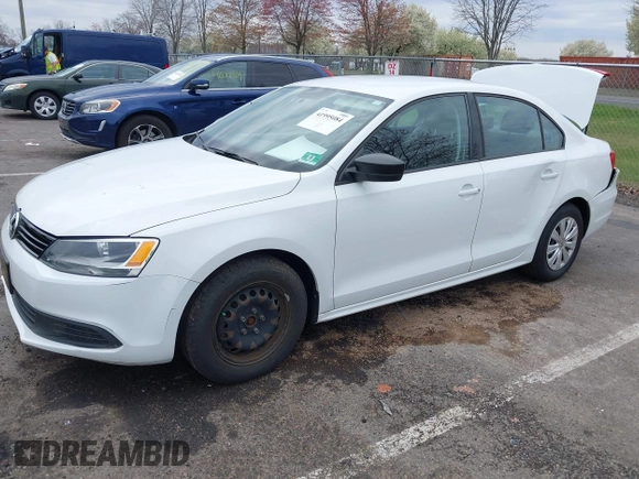 2014 Volkswagen Jetta Sedan S with VIN 3VW2K7AJ5EM329328, listed as a IAAI auction lot 41995084 with 72,409 mi miles. Bid and sale history available at carsss.com. Image 2.