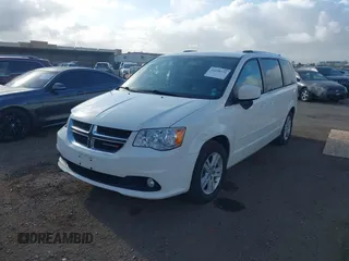 2013 Dodge Grand Caravan Crew with VIN 2C4RDGDG4DR606263, listed as a IAAI auction lot 41898351 with 127,044 mi miles and . Bid and sale history available at DreamBid. Image 17.