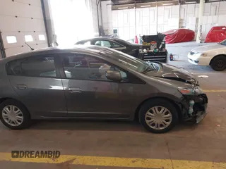 2010 Honda Insight LX with VIN JHMZE2H54AS040316, listed as a IAAI auction lot 41572246 with 142,850 mi miles and . Bid and sale history available at DreamBid. Image 13.