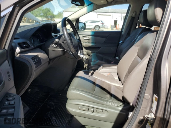 2011 Honda Odyssey Touring с VIN 5FNRL5H94BB078137, выставлен на аукционе Copart как лот 57467505 с пробегом 210 405 миль миль и Списание • Salvage title. История ставок и продаж доступна на DreamBid. Изображение 7.
