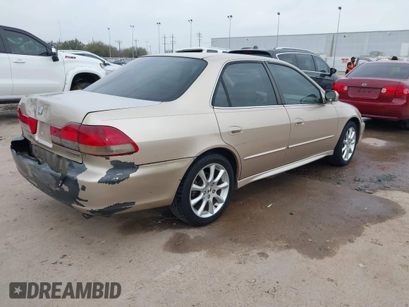 2001 Honda Accord EX z VIN 1HGCG165X1A077702, wystawiony jako IAAI lot #41770556 z przebiegiem 149 516 mil mil oraz . Historia ofert i sprzedaży dostępna na DreamBid. Obrazek 4.
