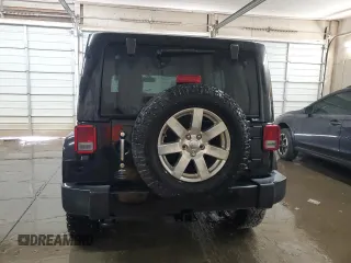 2017 Jeep Wrangler Unlimited Sahara with VIN 1C4BJWEG9HL698536, listed as a Copart auction lot 50700435 with 77,175 mi miles and Salvage Title. Bid and sale history available at carsss.com. Image 6.