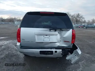 2013 GMC Yukon XL SLT z VIN 1GKS2KE73DR132065, wystawiony jako IAAI lot #40885853 z przebiegiem 207 492 mil mil oraz . Historia ofert i sprzedaży dostępna na DreamBid. Obrazek 17.