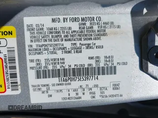 2014 Ford Fusion SE with VIN 1FA6P0H75E5397714, listed as a IAAI auction lot 42072025 with 145,664 mi miles. Bid and sale history available at carsss.com. Image 9.